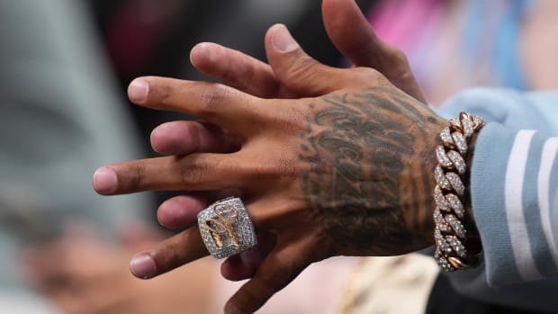 Apr 8, 2022; Miami, Florida, USA; A detailed view of the diamond ring with the words Chosen One worn by Carolina Panthers wide receiver Robbie Anderson as he sits courtside during the second half of the game between the Miami Heat and the Atlanta Hawks at FTX Arena.